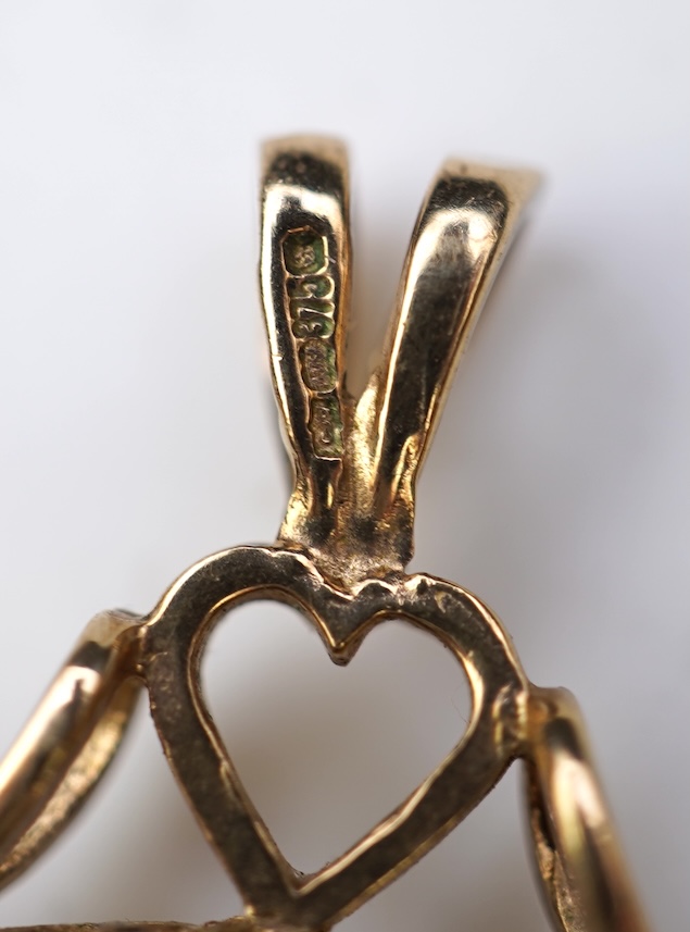 Three 9ct gold fob pendants